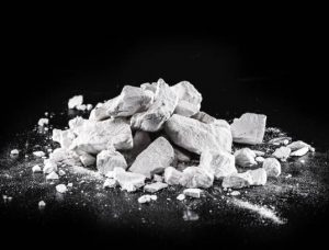 Calcium and Magnesium stones, black background. Called virgin lime or quicklime Calcium and Magnesium stones, black background. Called virgin lime or quicklime